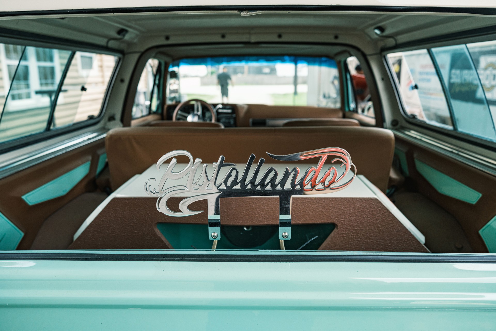 Vintage Low Rider SUV parked at the body shop